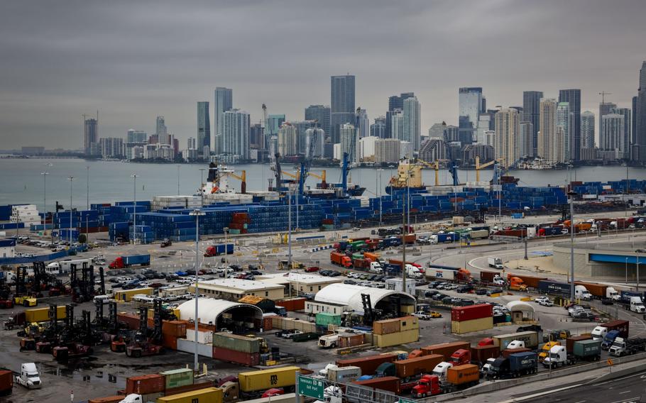 Trucks wait in line at PortMiami in Miami. 