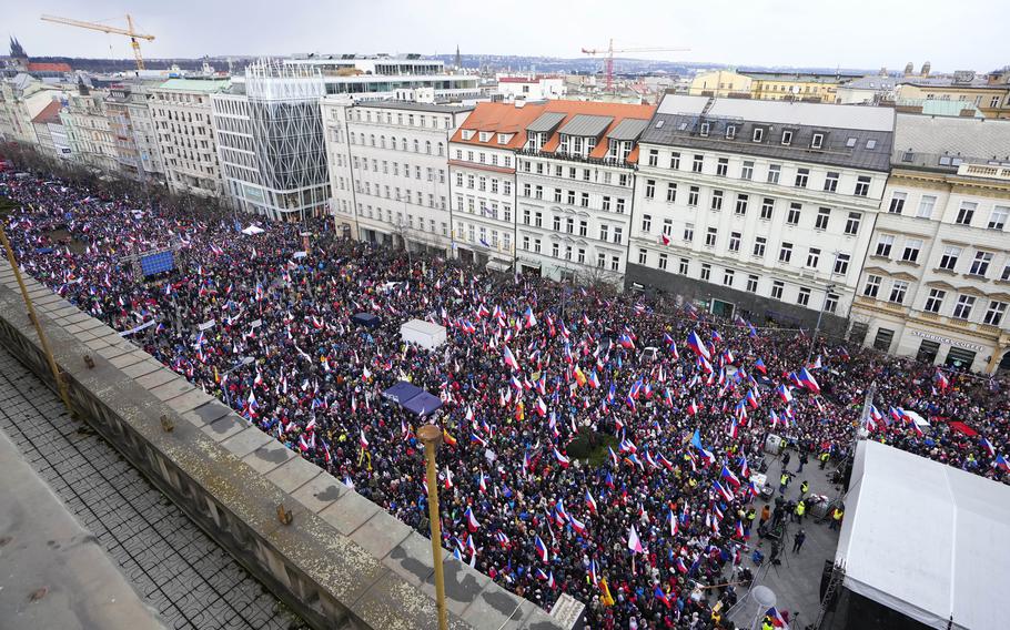 People gather for an anti-government demonstration at the Vencesla’s Square in Prague, Czech Republic, Saturday, March 11, 2023. Thousands of Czechs rallied on Saturday in the capital against the government, protesting high inflation and demanding the country’s end of military support for Ukraine invaded by Russia.