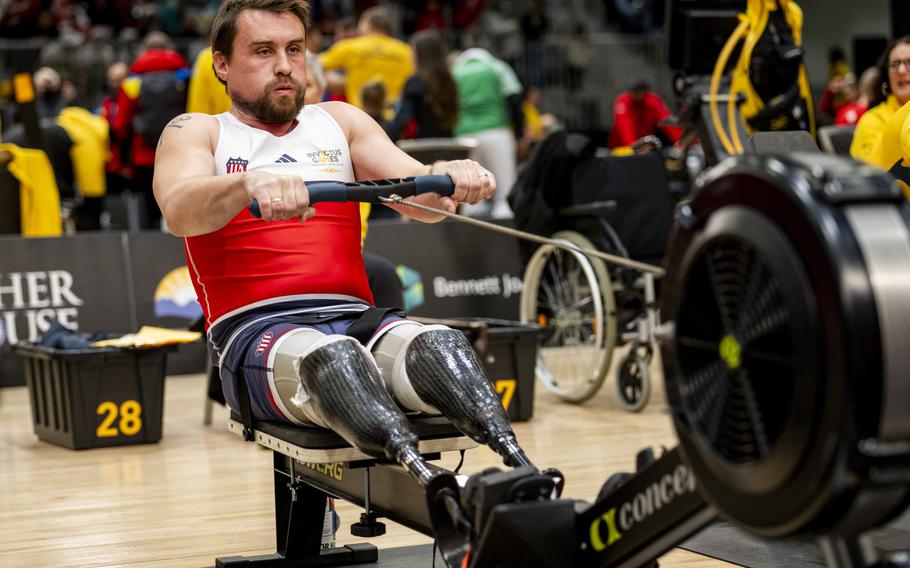 A competitor competes in indoor rowing