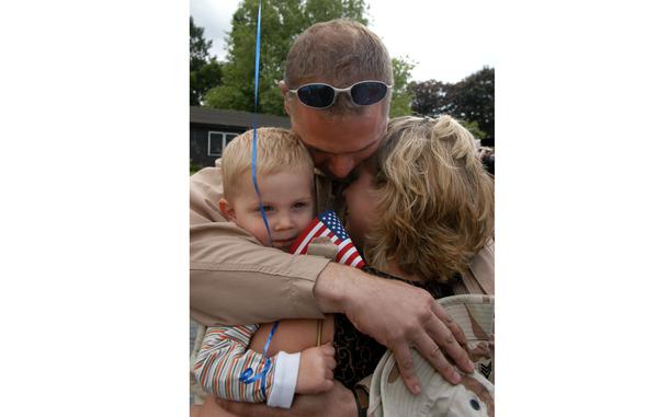 HED: Welcome Home, 2003

Wiesbaden, Germany, 14 May 14, 2003: Sgt. Kerry Boese and wife Sheila share a tender moment as son Samuel, 22 months, just seems happy to have dad home. Boese  and  other members of the 159th Medical Company, 421st Medical Evacuation Battalion returned to Wiesbaden, Germany from Operation Iraqi Freedom. 

META TAGS: Wars on Terror; Operation Iraqi Freedom; U.S. Army; military family