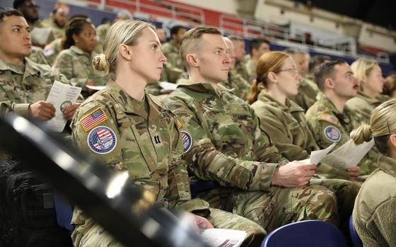 Soldiers from Army National Guard units across various states assigned to Joint Task Force-District of Columbia (JTF-DC) receive a briefing during Joint Reception, Staging, Onward Movement, and Integration at the D.C. Armory in Washington, D.C., Jan. 15, 2025.  Approximately 8,000 National Guard service members from approximately 40 states and territories comprise JTF-DC to support the 60th Presidential Inauguration, continuing a legacy that began in 1789 when their predecessors escorted George Washington to the first inauguration. At the request of civil authorities, these National Guard service members provide critical support such as crowd management, traffic control points, CBRN response, civil disturbance response and sustainment operations. Their expertise and seamless collaboration with interagency partners help ensure a safe and peaceful transition of power during this historic event. (U.S. Army National Guard photo by Staff Sgt. Kimberley Glazier)