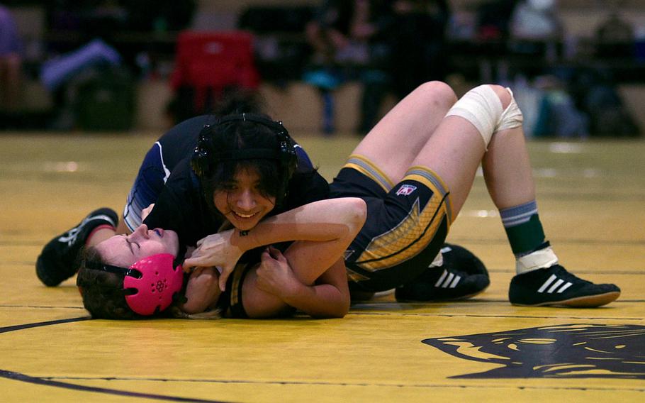 Ileana Rodriguez smiles after a pin.