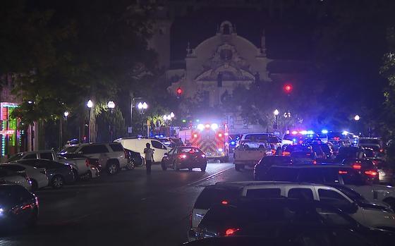 This image provided by WBMA shows police and emergency vehicles in the entertainment district after a shooting in Birmingham, Ala., Sunday, Sept. 22, 2024. (Bill Castle/WBMA via AP)