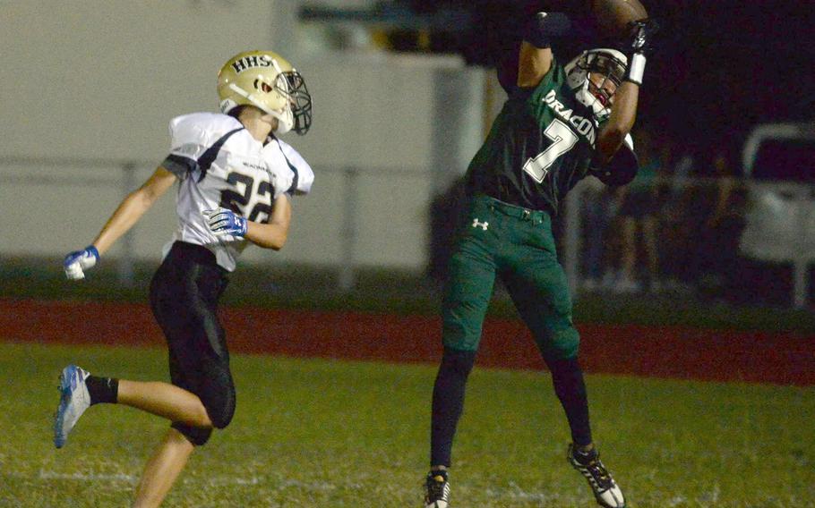 Kubasaki's Onzei Weaver catches a touchdown pass ahead of Humphreys' Andrew Thompson.