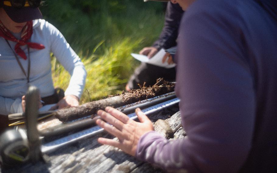 Researchers gather core samples along the Oregon coast.