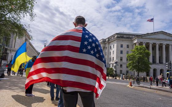 Activists supporting Ukraine demonstrate outside the Capitol in Washington, Saturday, April 20, 2024, as the House prepares to vote on approval of $95 billion in foreign aid for Ukraine, Israel and other U.S. allies. (AP Photo/J. Scott Applewhite)