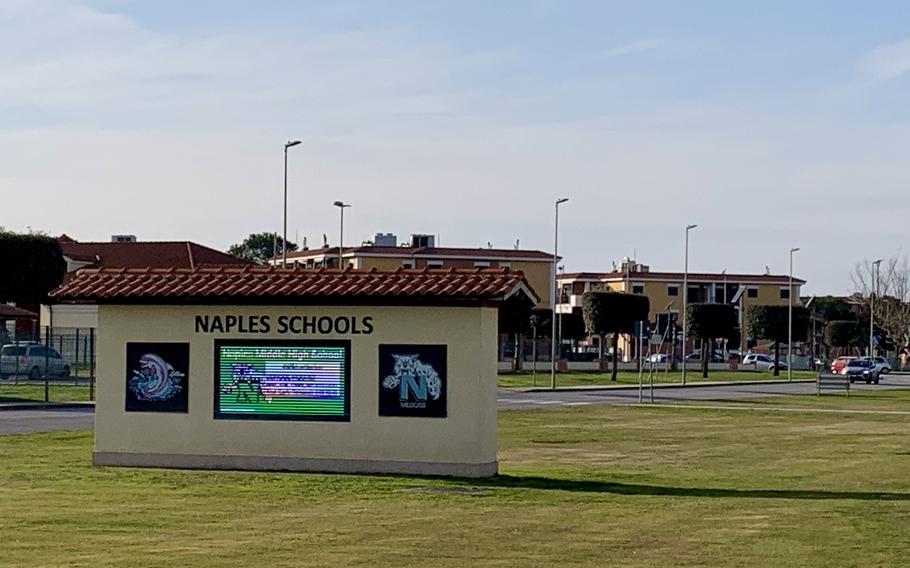 A sign for the Naples DODEA school.