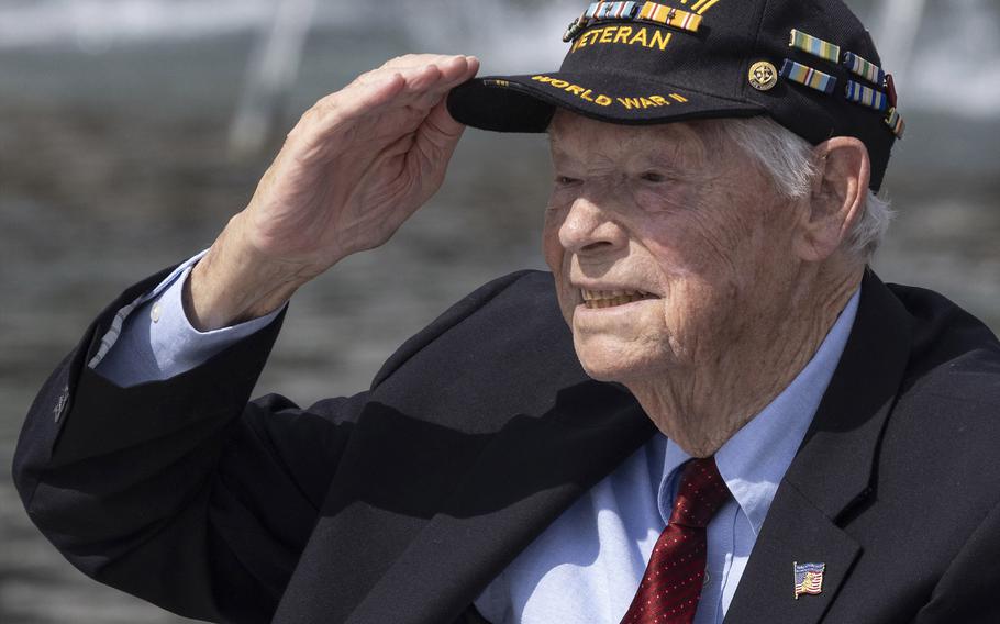 World War II Navy veteran Les Jones salutes as he's recognized during the 20th anniversary celebration of the National World War II Memorial in Washington, D.C., May 25, 2024.