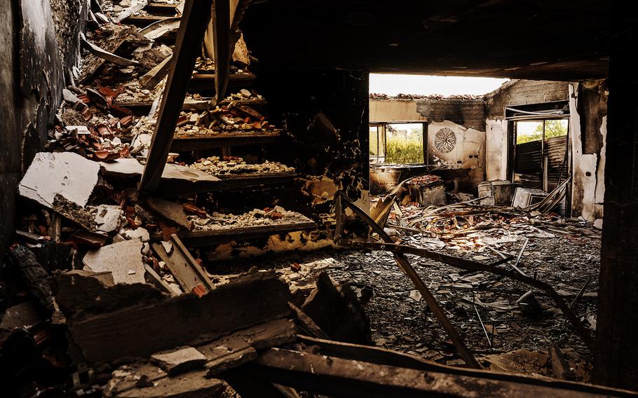Inside a burned-out house in Beeri, Israel, one of the places where Hamas militants massacred civilians on Oct. 7, 2023.