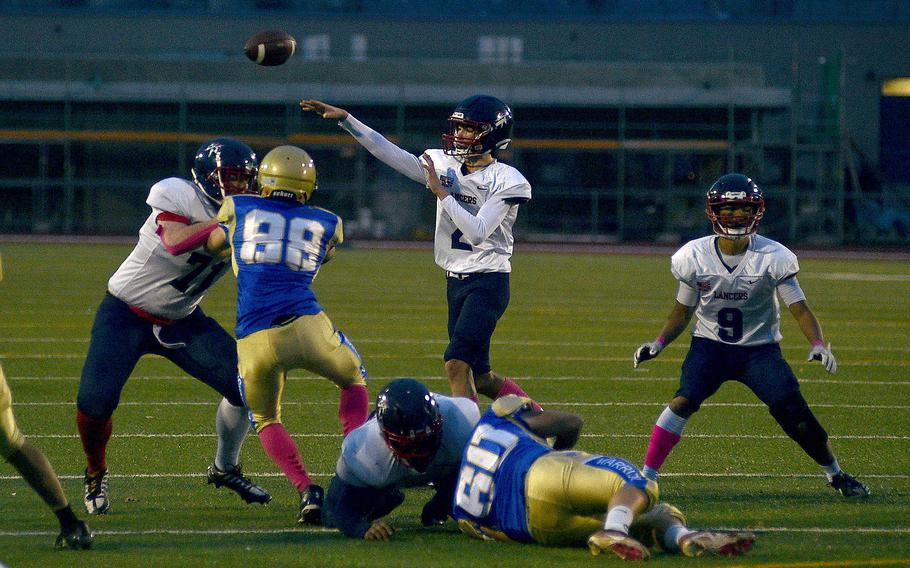 Parker Grimm throws a pass.