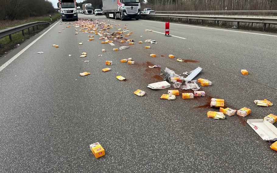 Coffee packages lay scattered on the A6 autobahn after an accident Wednesday.