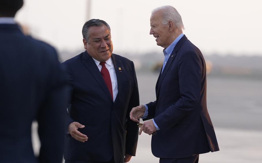 President Joe Biden moving to greet Peruvian Prime Minister Gustavo Adrianzen with his hand outstretched, Lima, Peru, Nov. 14, 2024.