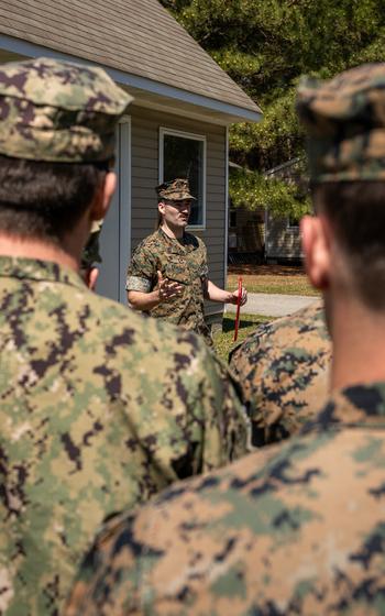 U.S. Marine Corps Gunnery Sgt. Benjamin Frazier talks about suicide awareness after being awarded the Navy and Marine Corps Commendation Medal at Naval Air Station Dam Neck, Va., Thursday, March 21, 2024. 