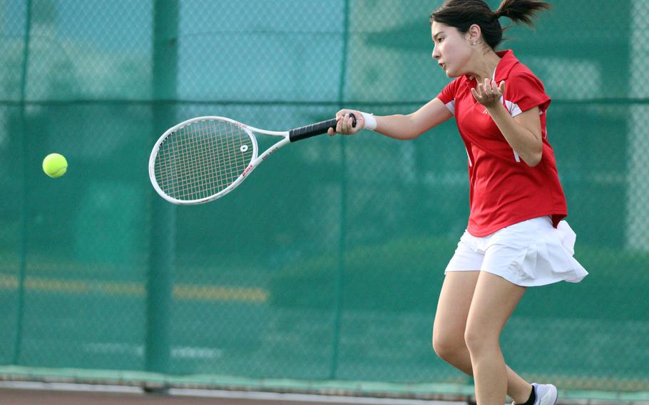 Catherine Kerns plays tennis.