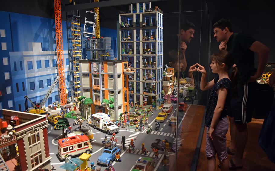A Playmobil city with various buildings and busy streets is part of the “We Love Playmobil” 50th anniversary exhibition at the Historical Museum of the Pfalz in Speyer, Germany. Visitors can catch the exhibition through Sept. 15.