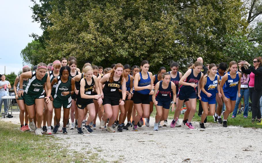 Girls cross country runners prepare to race at Lago di Fimon outside Vicenza, Italy, on Saturday, Sept. 14, 2024.