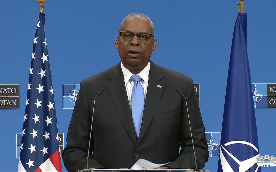 Defense Secretary Lloyd Austin speaks to reporters in Brussels, Oct. 18, 2024.