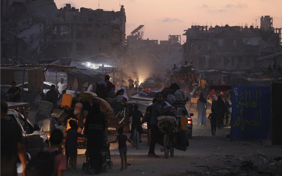 Displaced Palestinians in the Gaza Strip flee from parts of Khan Younis on July 1, 2024, following an evacuation order by the Israeli army to leave.