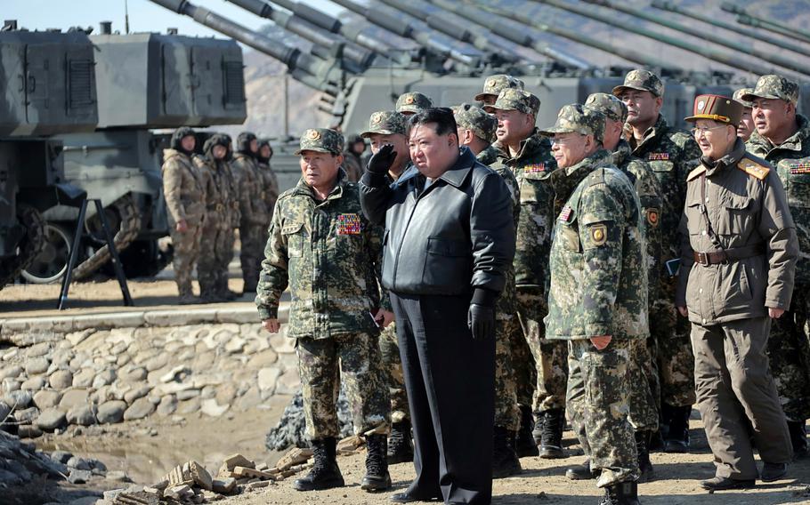 North Korean leader Kim Jong Un observes marksmanship training, March 6, 2024, in this image from the state-run Korean Central News Agency.