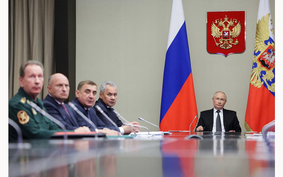 Russia’s President Vladimir Putin, right, chairs a meeting on Aug. 12, 2024, in his residence in Novo-Ogaryovo outside Moscow, regarding the situation in the Kursk region. 