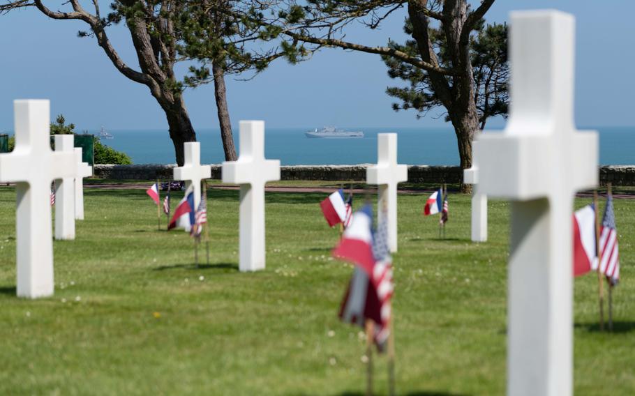 Military ships seen in the English Channel from Normandy American Cemetery on June 6, 2024.