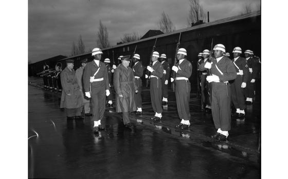 Kitzingen, Germany, Jan. 13, 1948:  Lt. Gen. Clarence R. Huebner (center) inspects the honor guard commanded by 1/Lt. Roscoe Cartwright at the Kitzingen Basic Training Center for Negro troops. The deputy EUCOM commander toured the extensive former air base with 20 generals and staff officers.

At the time of Huebner's visit, the U.S. Armed Forces were still segregated. President Harry Truman’s executive order 9981 abolishing discrimination in the armed services “on the basis of race, color, religion or national origin,” which led to the end of segregation in the services, was issued July 26, 1948.

During his visit, Lt. Gen. Huebner noted: "There are 14,000,000 Negroes in the U.S.," Huebner stated. "If the Nation is to utilize this manpower in the Army, we must develop its leadership potential."

Read more at: https://www.stripes.com/history/1948-01-23/huebner-visits-school-for-black-troops-1570552.html1

Looking for Stars and Stripes’ historic coverage? Subscribe to Stars and Stripes’ historic newspaper archive! We have digitized our 1948-1999 European and Pacific editions, as well as several of our WWII editions and made them available online through https://starsandstripes.newspaperarchive.com/

META TAGS:  African American; African American history; segregation; desegregation; U.S. Army; U.S. European Command; EUCOM; race relations; racism; education; military education; discrimination; servicemembers