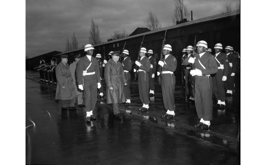 Lt. Gen. Clarence R. Huebner inspects the honor guard