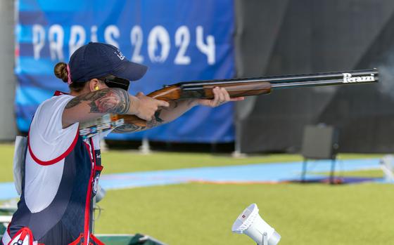 Rachel Tozier, a U.S. Army staff sergeant, takes aim during the second day of shooting in the Olympic women's trap on July 31, 2024, at the Chateauroux Shooting Centre in Chateauroux, France.