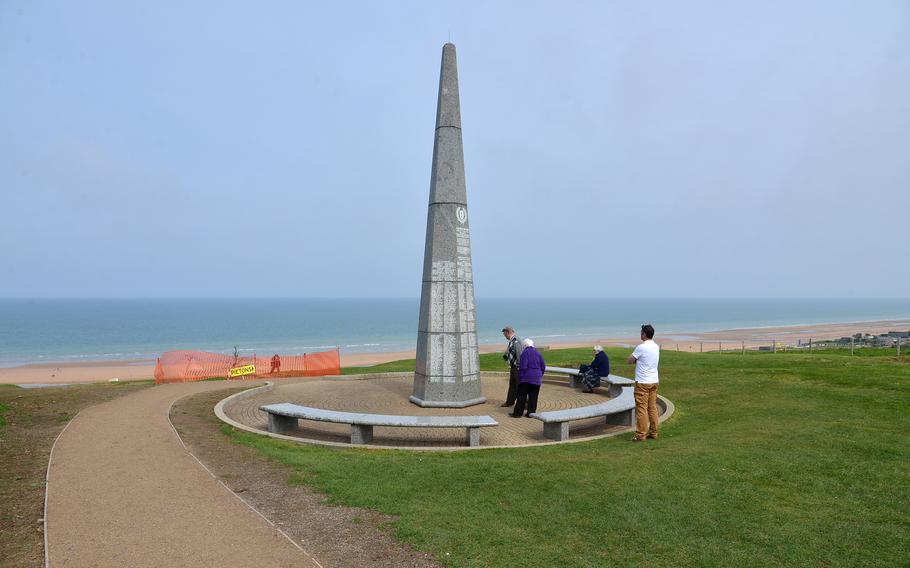 The 1st Infantry Monument stands on a bluff overlooking Omaha Beach, near the Normandy American Cemetery on the outskirts of Colleville-sur-Mer.