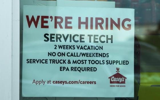 A hiring sign is displayed at a gas station in Vernon Hills, Ill., Monday, June 3, 2024. On Thursday, June 13, 2024, the Labor Department reports on the number of people who applied for unemployment benefits last week. 