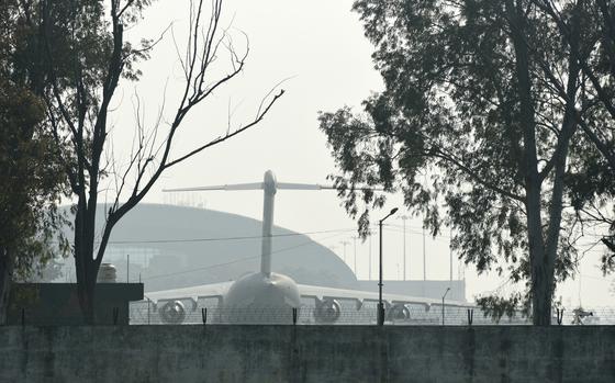 A US military plane is parked at the international airport in Amritsar, India.