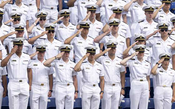 U.S. Naval Academy Midshipmen salute during the playing of the national anthem at the U.S. Naval Academy's Class of 2024 graduation ceremony at Navy-Marine Corps Stadium, Annapolis, Md., May 24, 2024. (DoD photo by U.S. Navy Petty Officer 1st Class Alexander Kubitza)