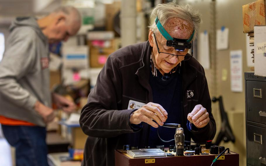 Gilles Vrignaud, a lifetime member of the California Historical Radio Society, tests a vacuum tube while volunteering at the Bay Area Radio Museum in Alameda, Calif., on March 2. The museum is run by volunteers from the society. 