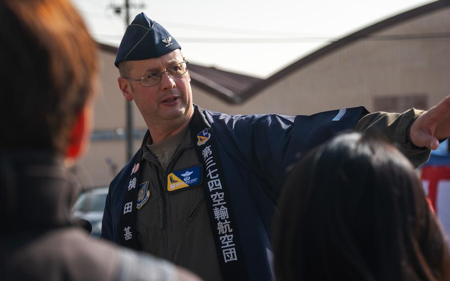 Col. Richard McElhaney points out at the crowd.