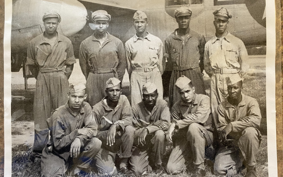 Russell Nalle kneels in the first row, second from the left, in this undated photo of Tuskegee Airmen who flew fighter planes and provided ground support for the Black air crews during World War II. “I wouldn’t have missed that experience for anything,” said Nalle, who recalled knocking a freight train from its tracks as he piloted a twin-engine fighter plane over Germany. 