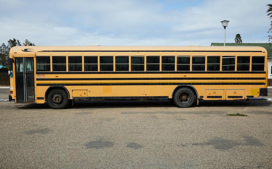 An elementary school student was killed and 23 other children were injured after a minivan hit their school bus on the first day of school, Ohio authorities said.