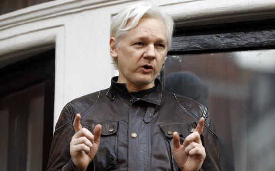 Julian Assange speaks to the media outside the Ecuadorian embassy in London in May 2017.