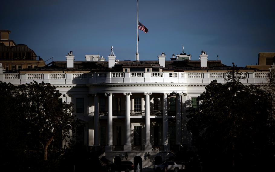 The American flag over the White House is lowered to half-staff