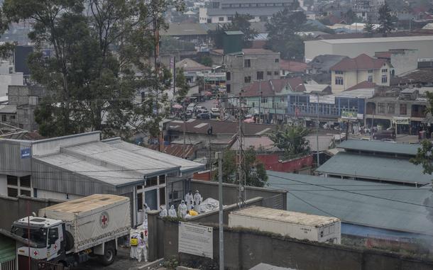 Red Cross personnel load bodies of victims of the fighting between Congolese government forces and M23 rebels in a truck in Goma, Monday, Feb. 3, 2025, as the U.N. health agency said 900 died in the fight. (AP Photo/Moses Sawasawa)