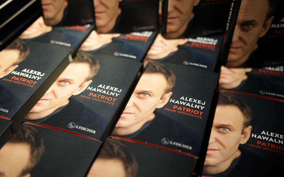 Copies of the late Russian opposition leader Alexei Navalny’s memoir entitled ‘Patriot’ are put display on the first day of sale in a bookshop in Berlin, Germany, Tuesday, Oct. 22, 2024.