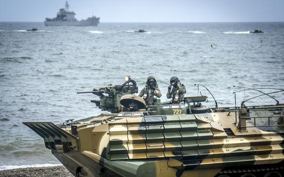 South Korean marines keep an eye on the beach during amphibious-assault training in Pohang, South Korea, Sept. 2, 2024.