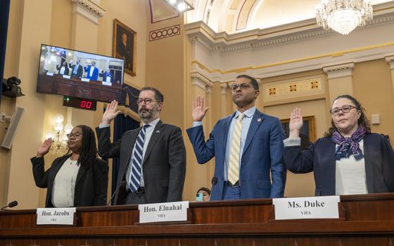 From left, Chief Financial Officer Lasheeco Graham, Veterans Benefits Administration, Under Secretary for Benefits Joshua Jacobs, U.S. Department of Veterans Affairs, Under Secretary for Health Shereef Elnahal, U.S. Department of Veterans Affairs and Chief Financial Officer Laura Duke,Veterans Benefits Administration, are sworn in during a House Veterans’ Affairs Committee  hearing titled “Fact and Fiction: Getting to the Bottom of the VA Budget Shortfall”, Dec. 5, 2024 in Washington. (Eric Kayne/Stars and Stripes)