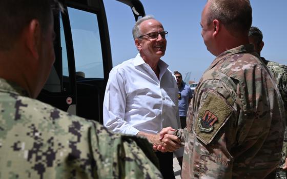 210707-N-OX321-1003 NAVAL AIR STATION SIGONELLA, Italy (July 7, 2021)-- U.S. Sen. Jerry Moran, is greeted by U.S. Air Force Lt. Col. David Hind, commanding officer of the 7th Reconnaissance Squadron (7RS), before a tour of the 7RS hangar and Global Hawks, as part of the congressional delegation visit to Naval Air Station (NAS) Sigonella, July 7, 2021. NAS Sigonella’s strategic location enables U.S., allied, and partner nation forces to deploy and respond as required ensuring security and stability in Europe, Africa and Central Command. (U.S. Navy photo by Mass Communication Specialist 1st Class Kegan E. Kay)