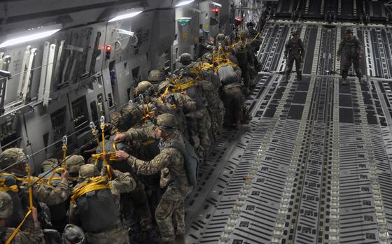 HED: Saber Junction, 2016

Hohenfels, Germany, April 11, 2016: Soldiers from the 173rd Airborne Brigade and Italian troops get set to jump out of a C-17 above Hohenfels, Germany, as part of exercise Saber Junction. Fifty-one made it out of the plane, but six had to return to Aviano Air Base after winds were judged to be too strong during the aircraft's third pass over the zone.

Read the full story of the 173rd's jump here. 
https://www.stripes.com/migration/us-army-s-173rd-paratroopers-jump-into-german-countryside-1.404107

META TAGS: Saber Junction; exercise; training; paratroopers; U.S. Army;