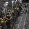 HED: Saber Junction, 2016

Hohenfels, Germany, April 11, 2016: Soldiers from the 173rd Airborne Brigade and Italian troops get set to jump out of a C-17 above Hohenfels, Germany, as part of exercise Saber Junction. Fifty-one made it out of the plane, but six had to return to Aviano Air Base after winds were judged to be too strong during the aircraft's third pass over the zone.

Read the full story of the 173rd's jump here. 
https://www.stripes.com/migration/us-army-s-173rd-paratroopers-jump-into-german-countryside-1.404107

META TAGS: Saber Junction; exercise; training; paratroopers; U.S. Army;