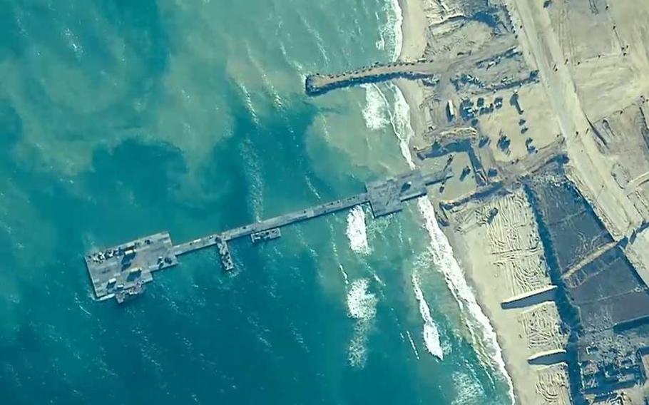 Overhead imagery shows the U.S.-built temporary pier off the coast of Gaza being used to deliver humanitarian aid.
