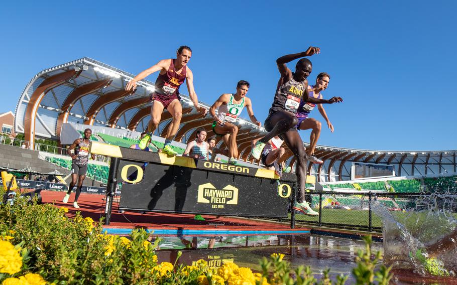 Army Sgt. Anthony Rotich completes the water jump during a men’s 3,000-meter steeplechase race at the 2023 USA Track and Field Outdoor Championships held in Eugene, Ore., July 6, 2023. 