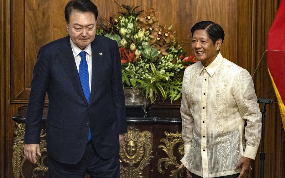 South Korean President Yoon Suk Yeol, left, meets with Philippine President Ferdinand Marcos Jr. at the Malacanang Palace Monday, Oct. 7, 2024 in Manila, Philippines.