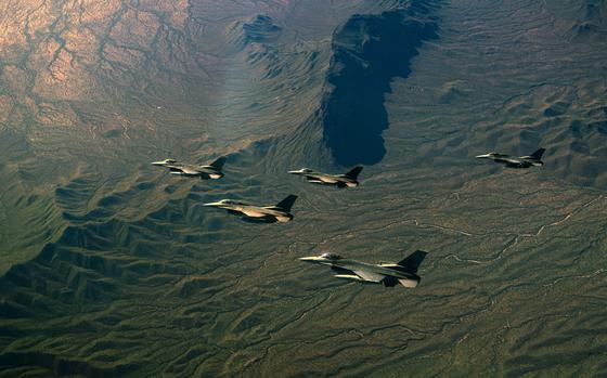 Five F-16 Fighting Falcons from Morris Air National Guard Base in Tucson, Ariz., fly in formation over southern Arizona on April 6, 2024. U.S. airmen from a base in Florida upgraded the electronic warfare capabilities of F-16s provided to Ukraine, and combat feedback from Ukrainian pilots will be provided. 