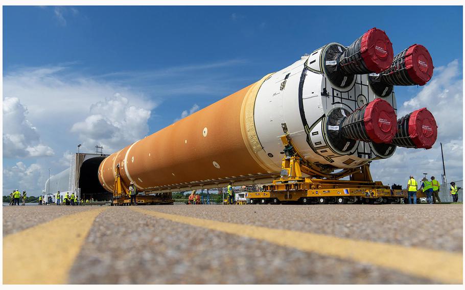 Move teams with NASA and Boeing position the massive rocket stage on special transporters to guide it onto the Pegasus barge on July 16, 2024, at NASA’s Michoud Assembly Facility in New Orleans ahead of its trip to Florida. 